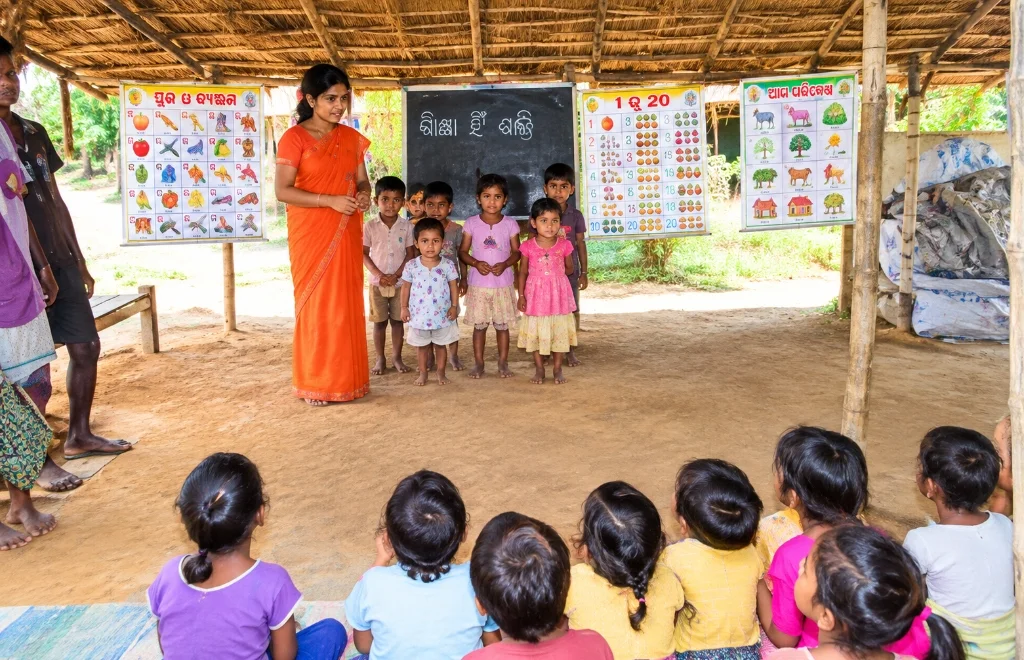 Community learning session conducted by a teacher for children